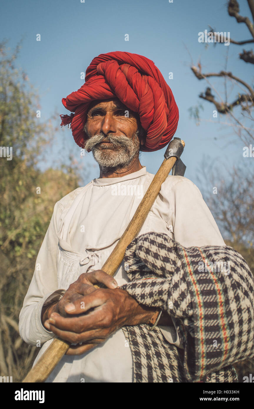 GODWAR REGION, INDIA - 13 FEBRUARY 2015: Rabari tribesman holds ...