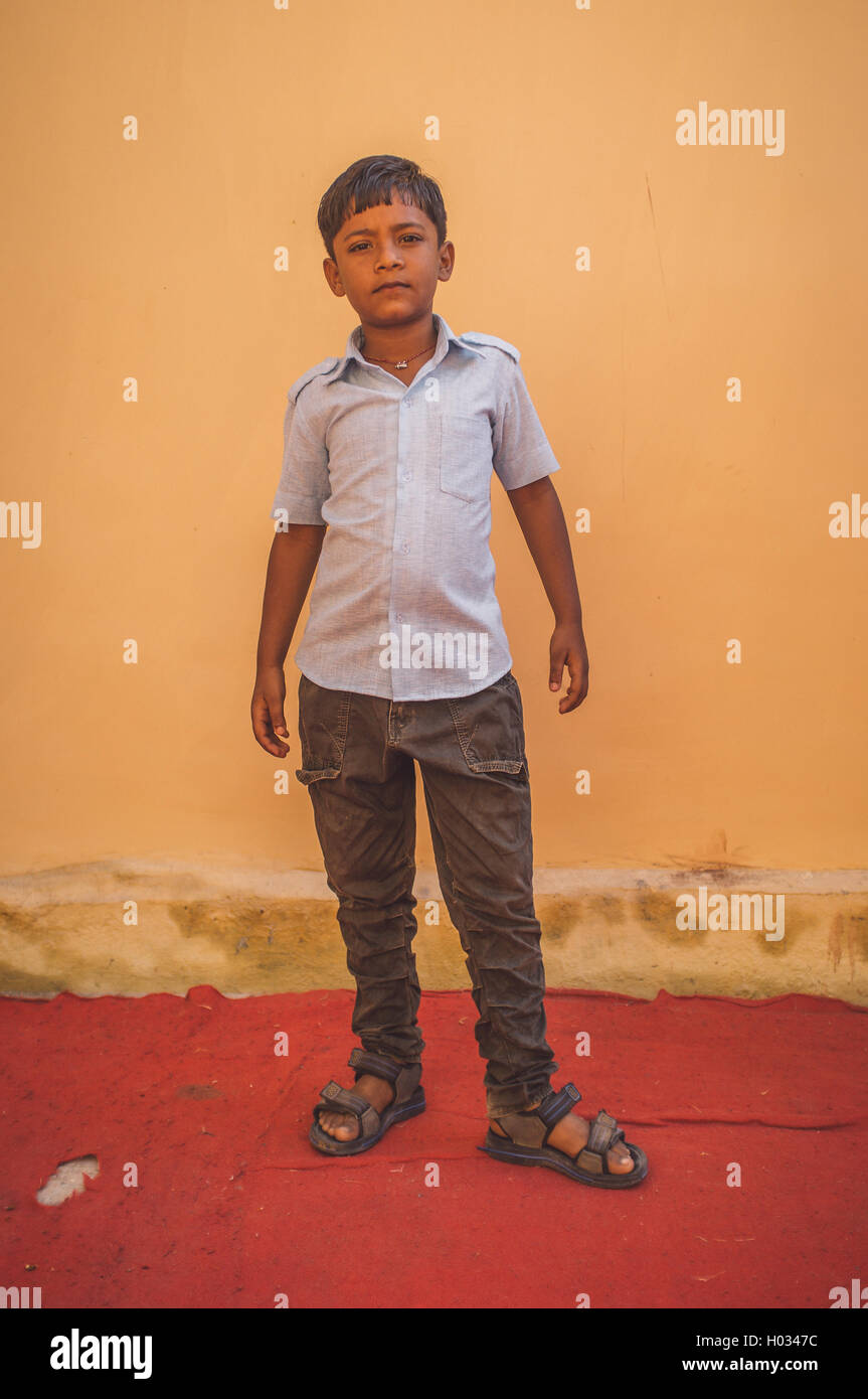 Young Indian boy posing on the road - PixaHive