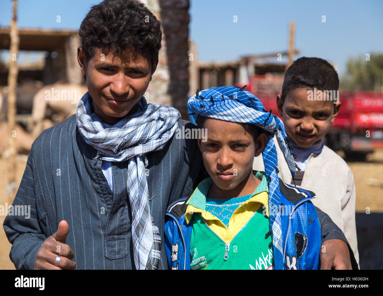 DARAW, EGYPT - FEBRUARY 6, 2016: Portrait of group of local boys at Camel market. Stock Photo