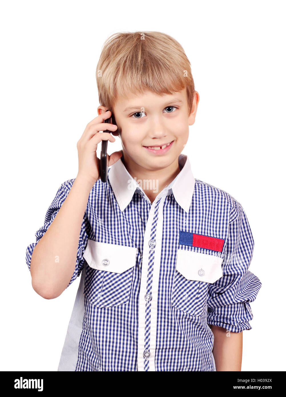 boy talking on smart phone Stock Photo