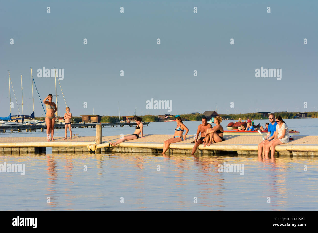 Rust: Neusiedler See (Lake Neusiedl), lido beach, public bath, swimmers, sailboat, Neusiedler See (Lake Neusiedl), Burgenland, A Stock Photo