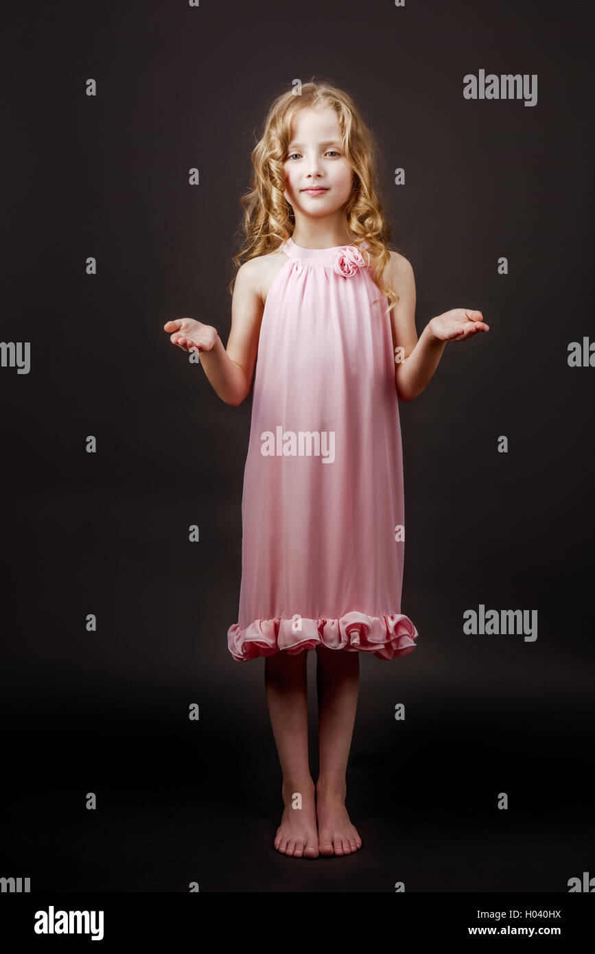 Charming pretty little girl dress Stock Photo