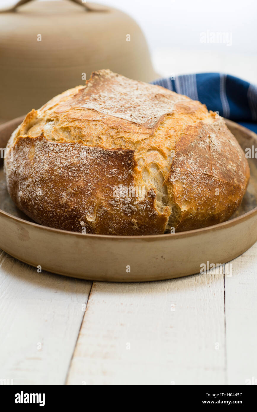 Freshly baked homemade sourdough loaf in a La Cloche baking dome Stock  Photo - Alamy