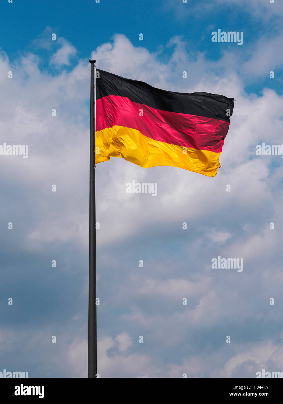 German flag flying on a mast Stock Photo Alamy