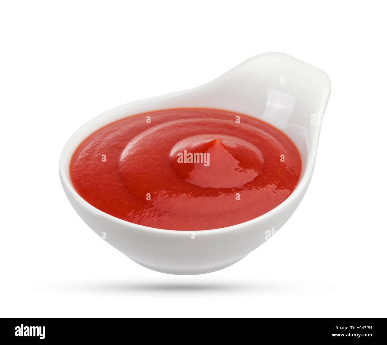 Tomato sauce in white bowl Stock Photo