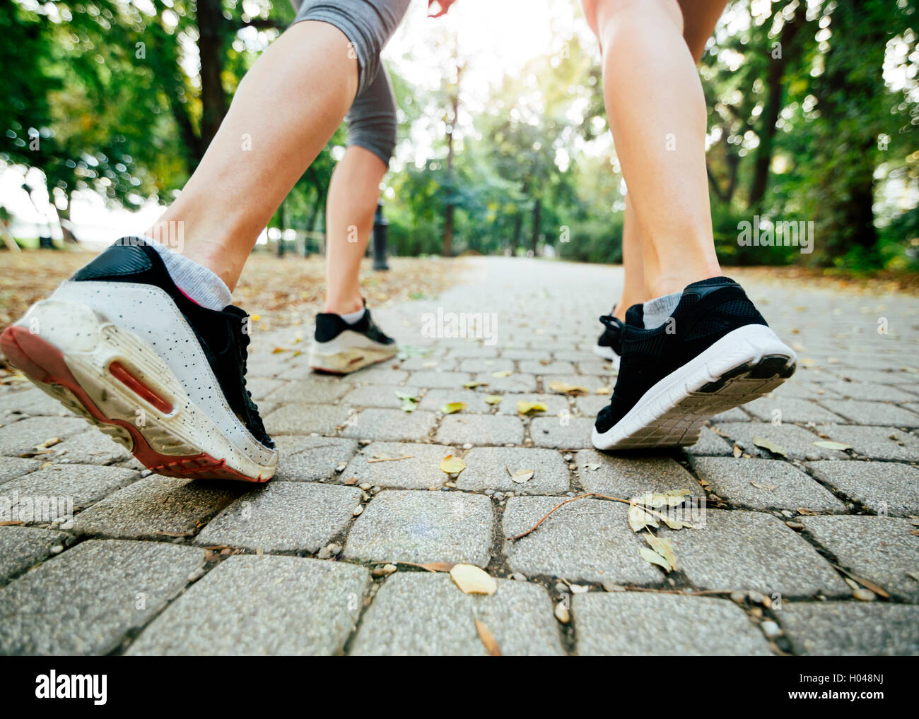 Closeup of joggers feet while in action and running Stock Photo Alamy