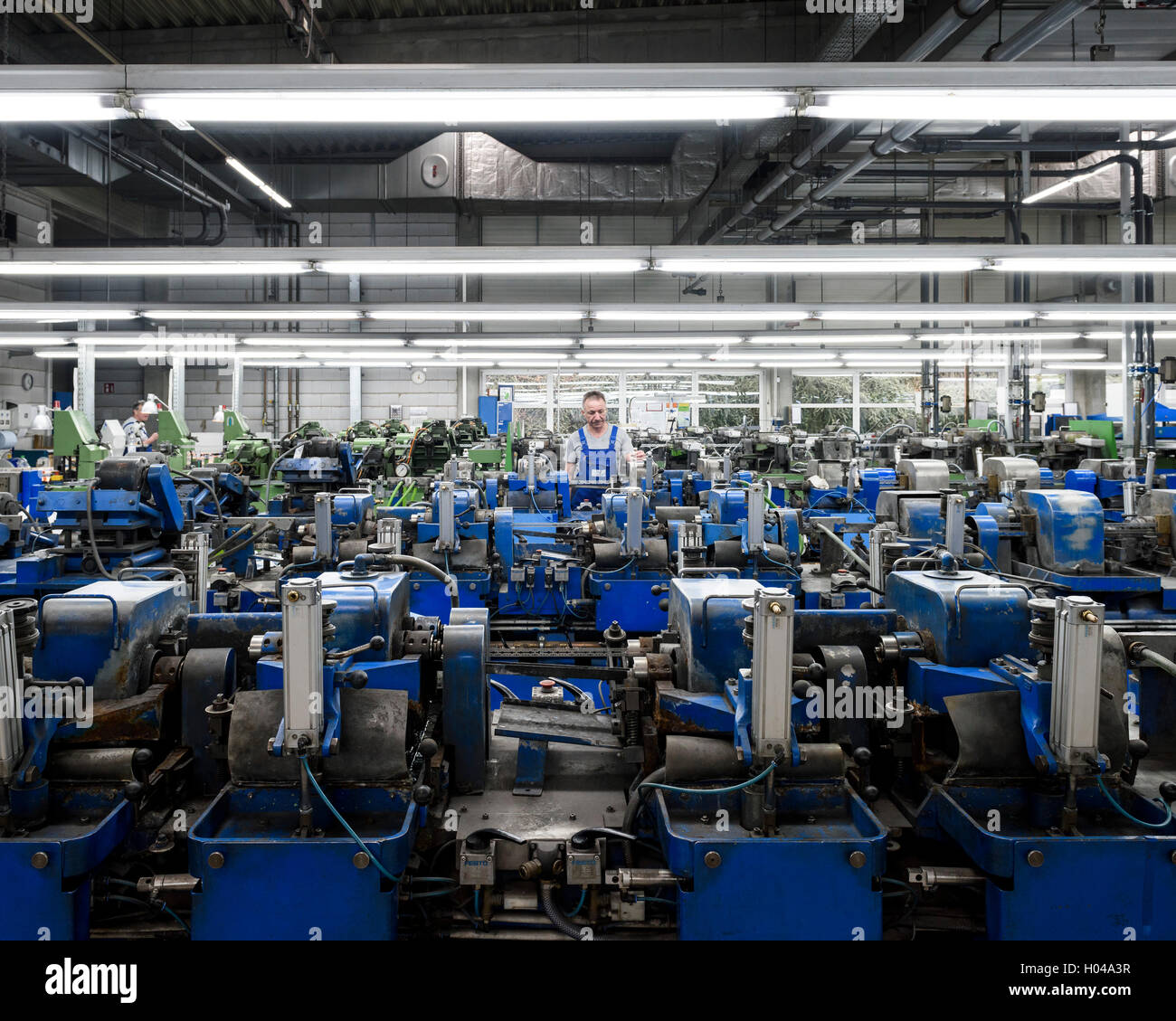 Razor blades being sharpened. Harry's Razor Blade Factory, Eisfeld