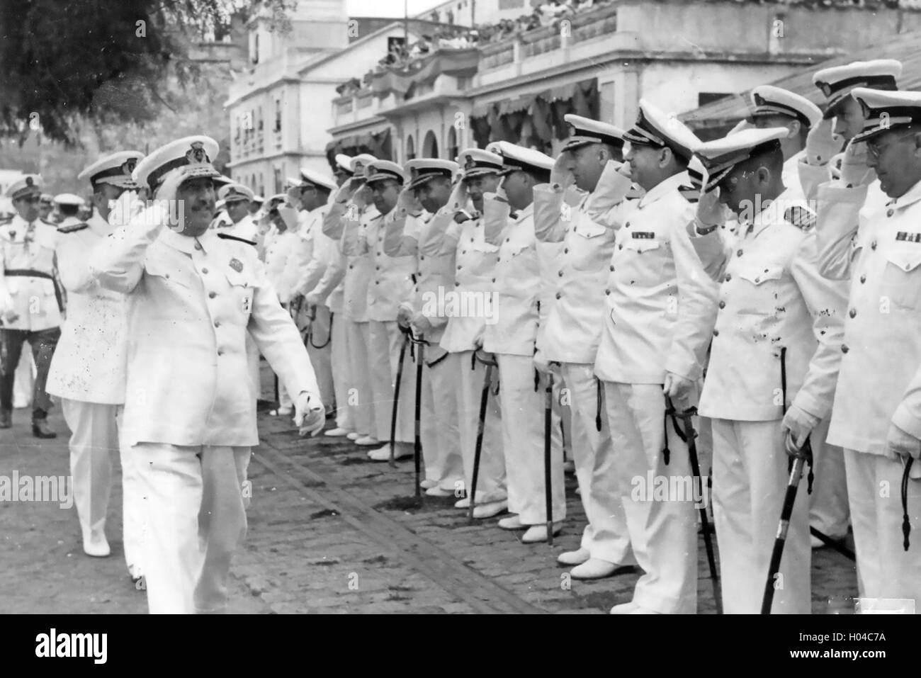 FRANCISCO FRANCO (1892-1975) Spanish Caudilo saluting naval officers at the Galician port of Ferrol about 1942 Stock Photo