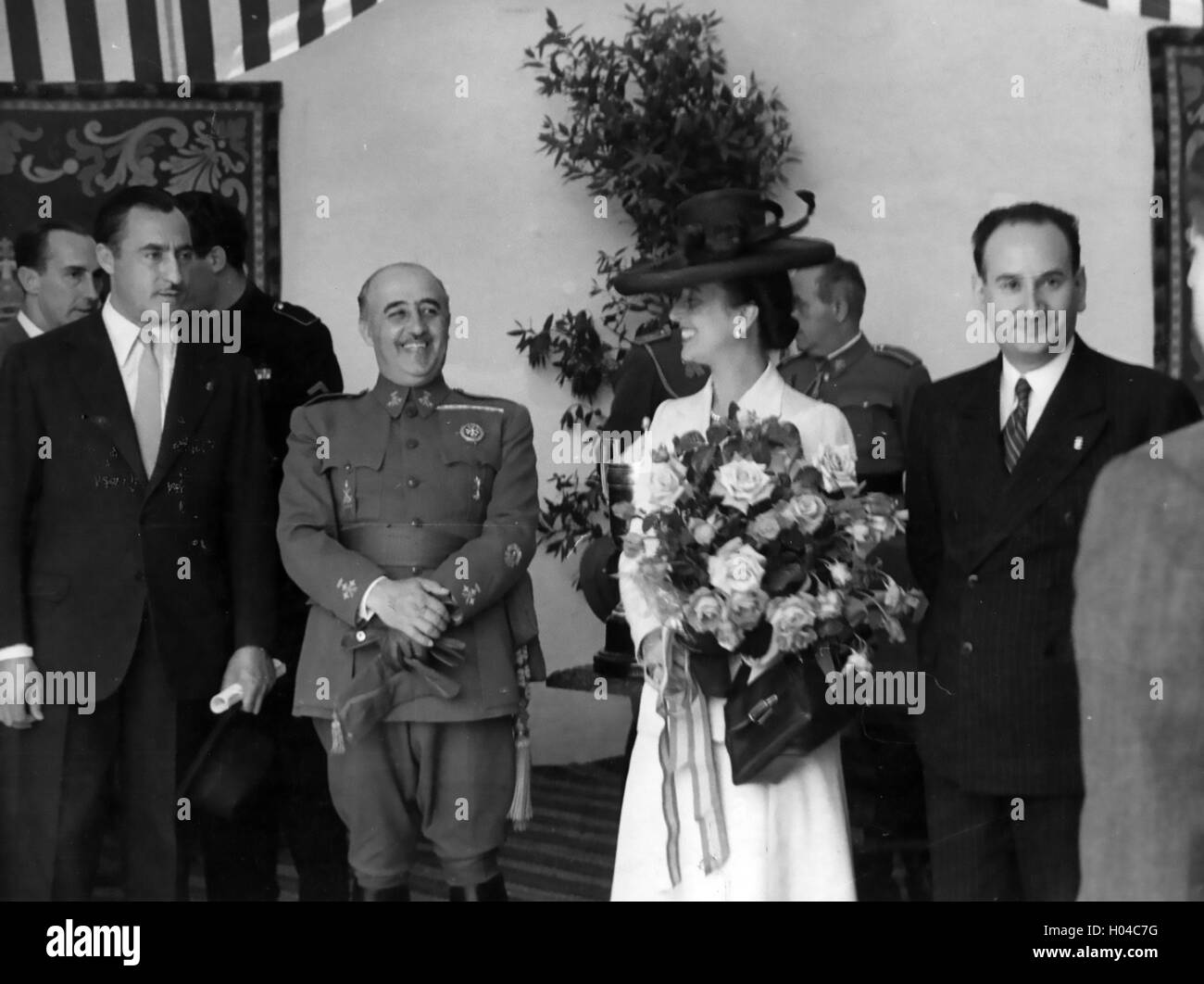 FRANCISCO FRANCO (1892-1975) Spanish Caudilo with his wife Carmen, the Secretary General of the Falange Party and the Minister of Agriculture at the Seville Fair about 1942 Stock Photo