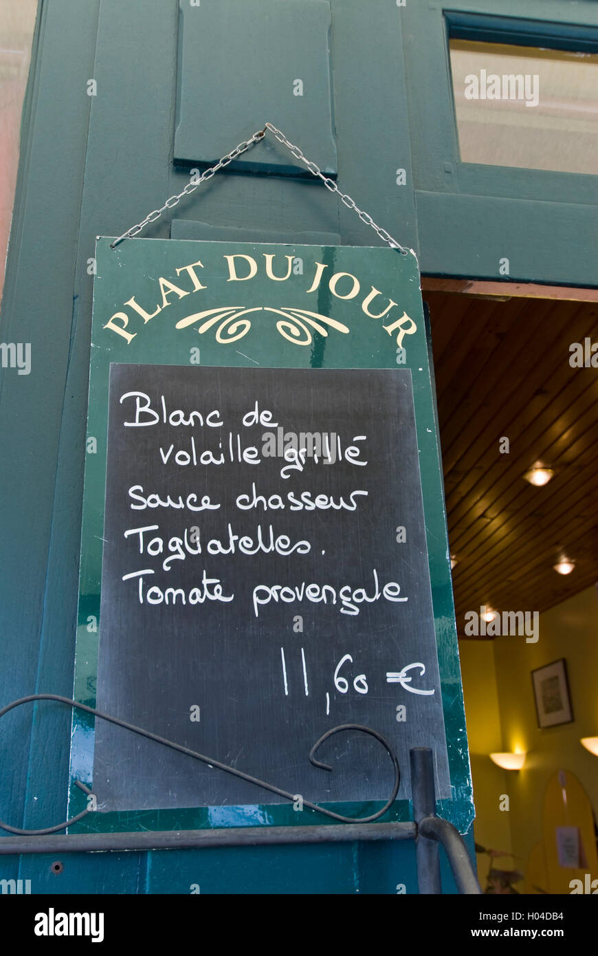 'Plat du Jour' blackboard menu with euros fixed price hanging outside French restaurant St-Émilion, Gironde, France Bordeaux Stock Photo