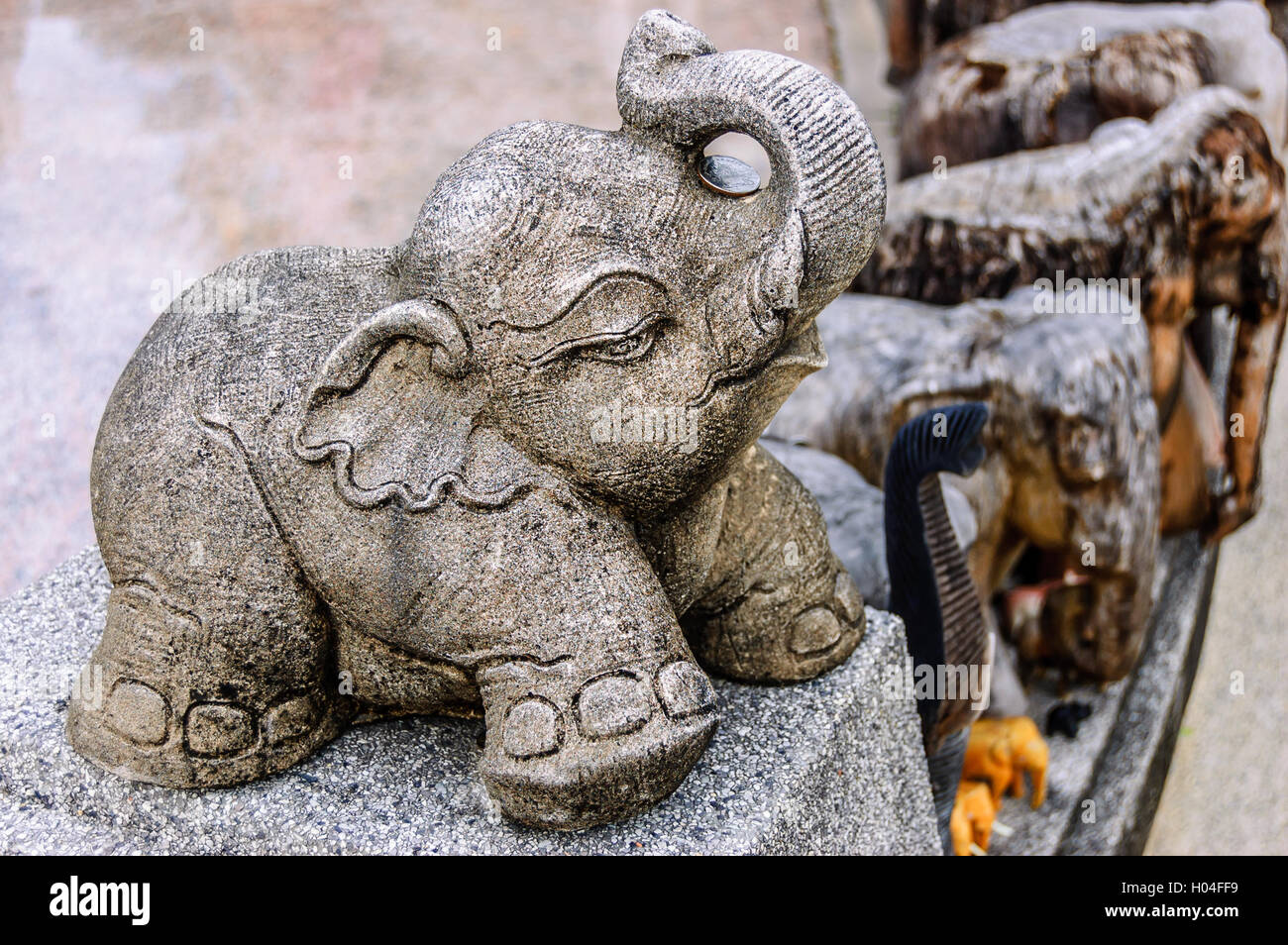 Elephant statues at Buddhist shrine, southern Thailand Stock Photo Alamy