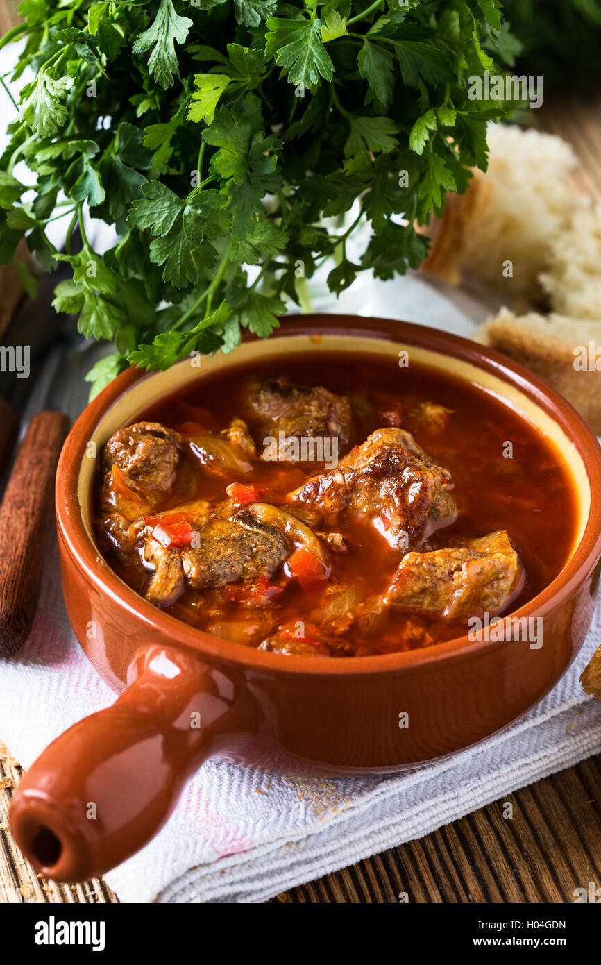 Meat stew in ceramic pot. Traditional Hungarian goulash Stock Photo Alamy