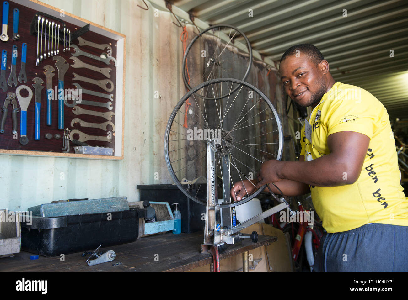 Bicycle technician building a wheel, Cape Town, South Africa Stock