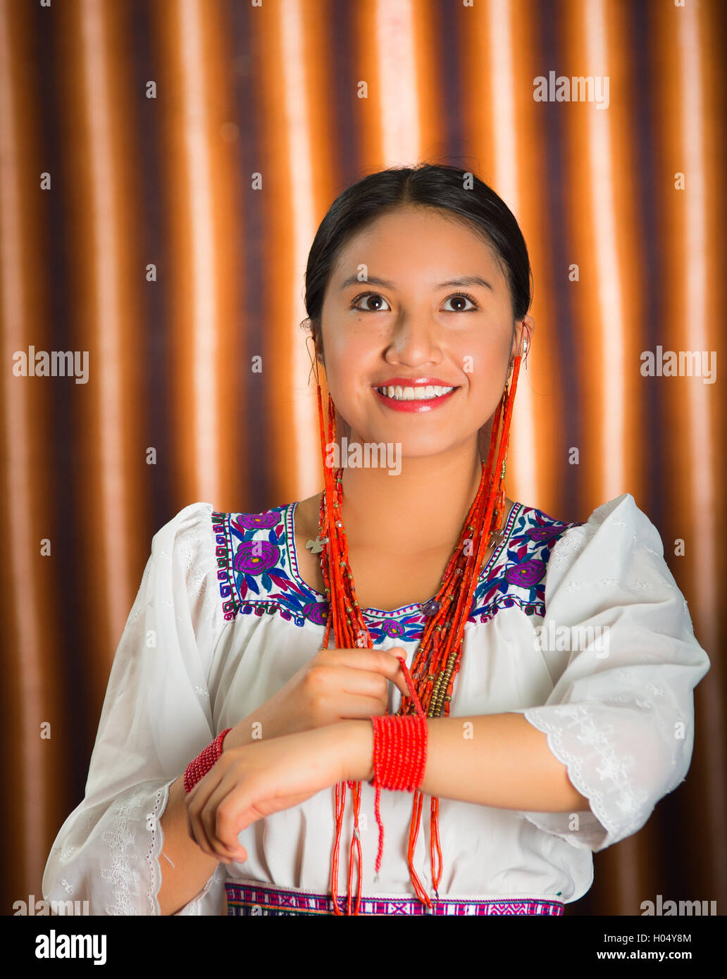 Beautiful Hispanic Model Wearing Andean Traditional Clothing Smiling