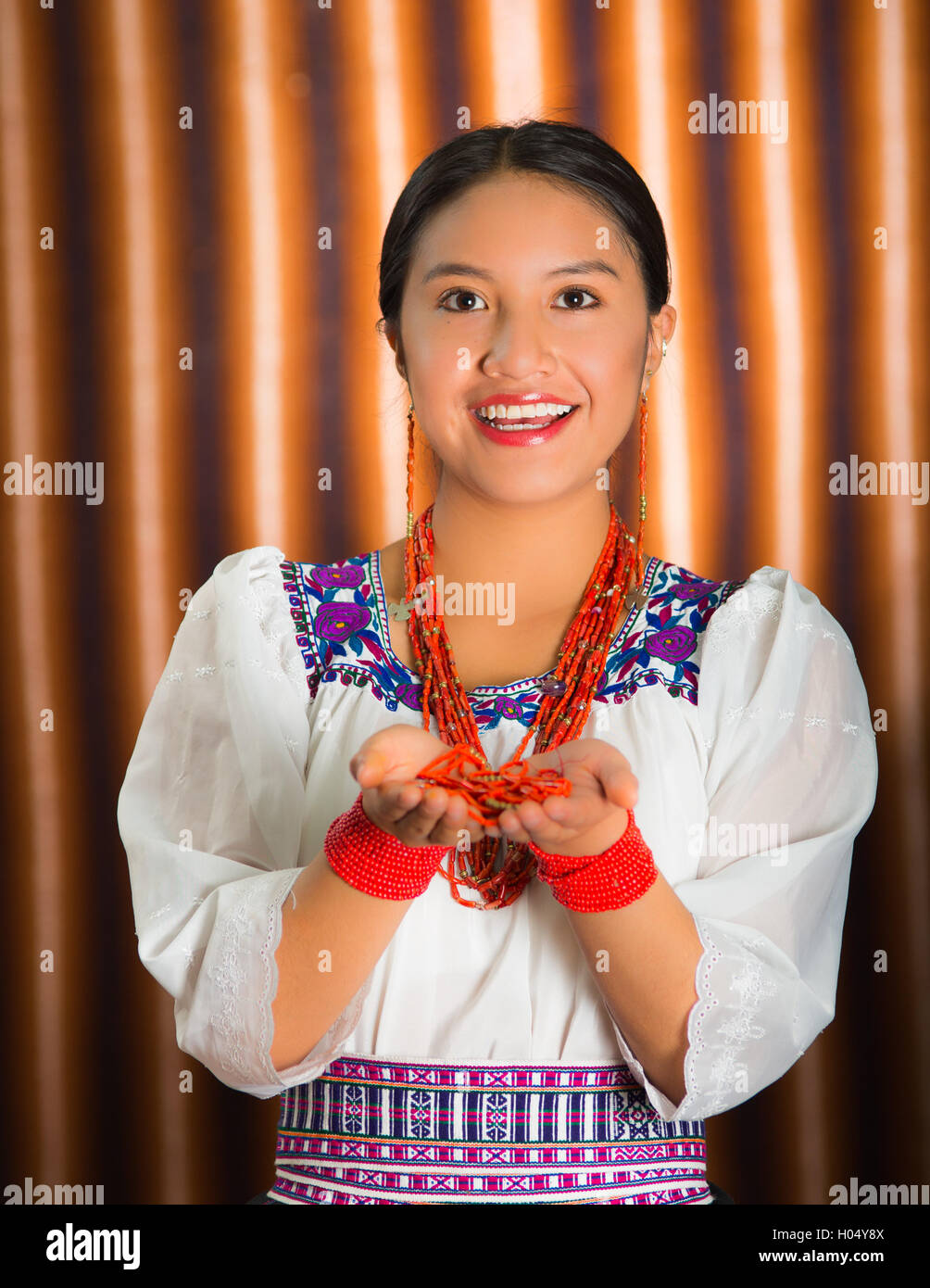 Beautiful Hispanic Model Wearing Andean Traditional Clothing Smiling