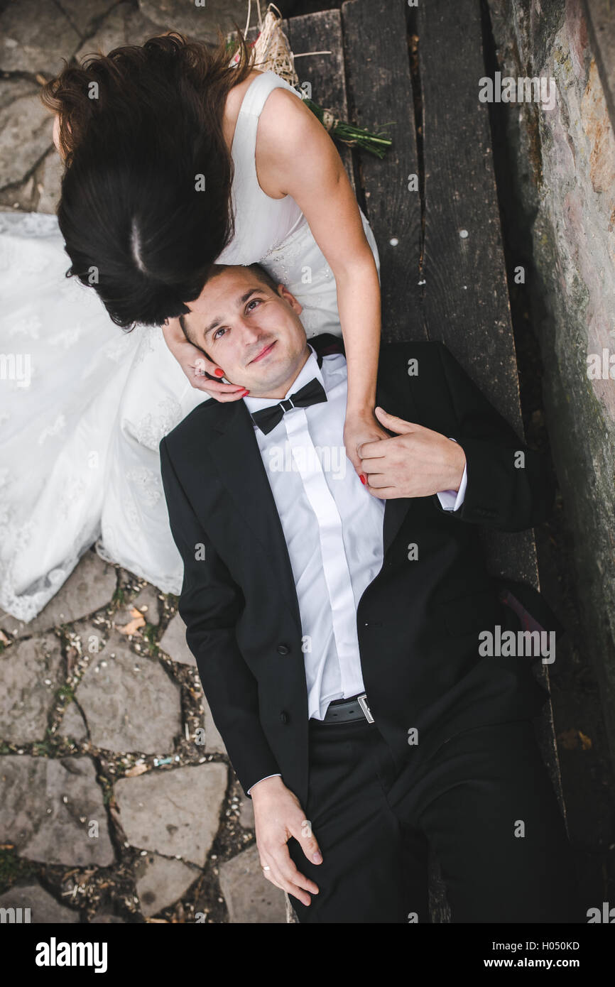 Bride on groom lap hi-res stock photography and images - Alamy