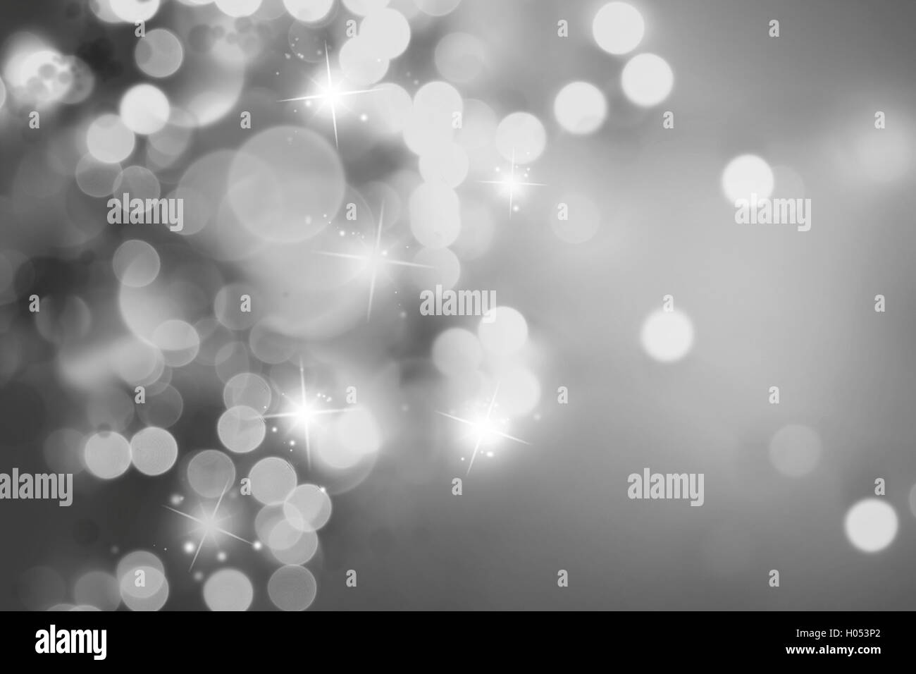 Abstract bokeh circles and stars background Stock Photo