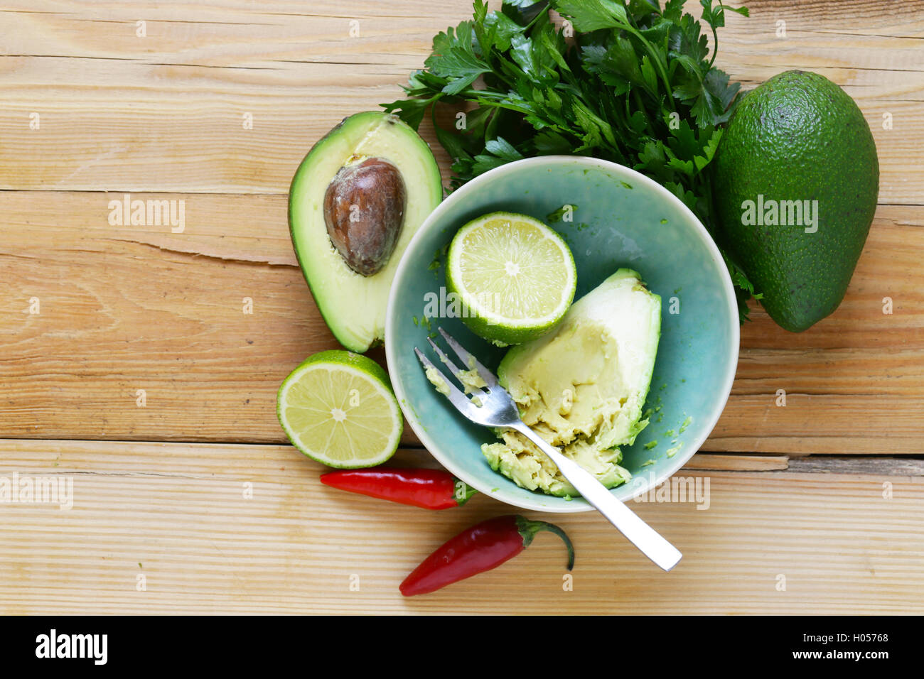 dip of avocado guacamole and corn chips, Mexican food Stock Photo