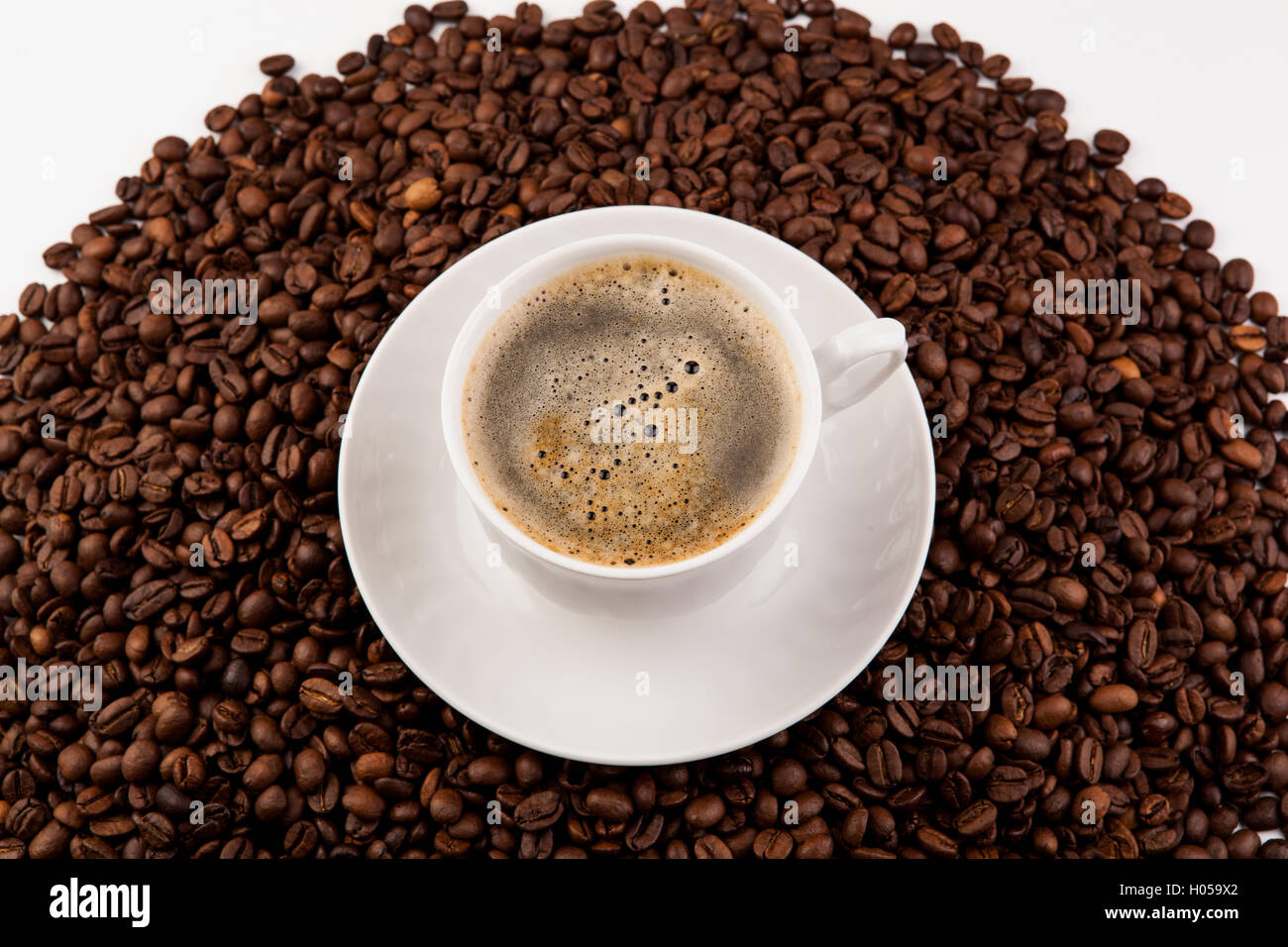 cup of black coffee with foam Stock Photo Alamy