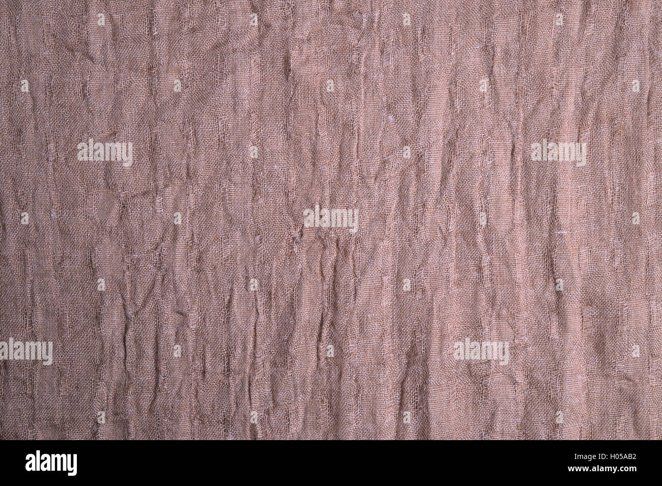 Brown light cotton scarf. Fashion, textures and backgrounds Stock Photo