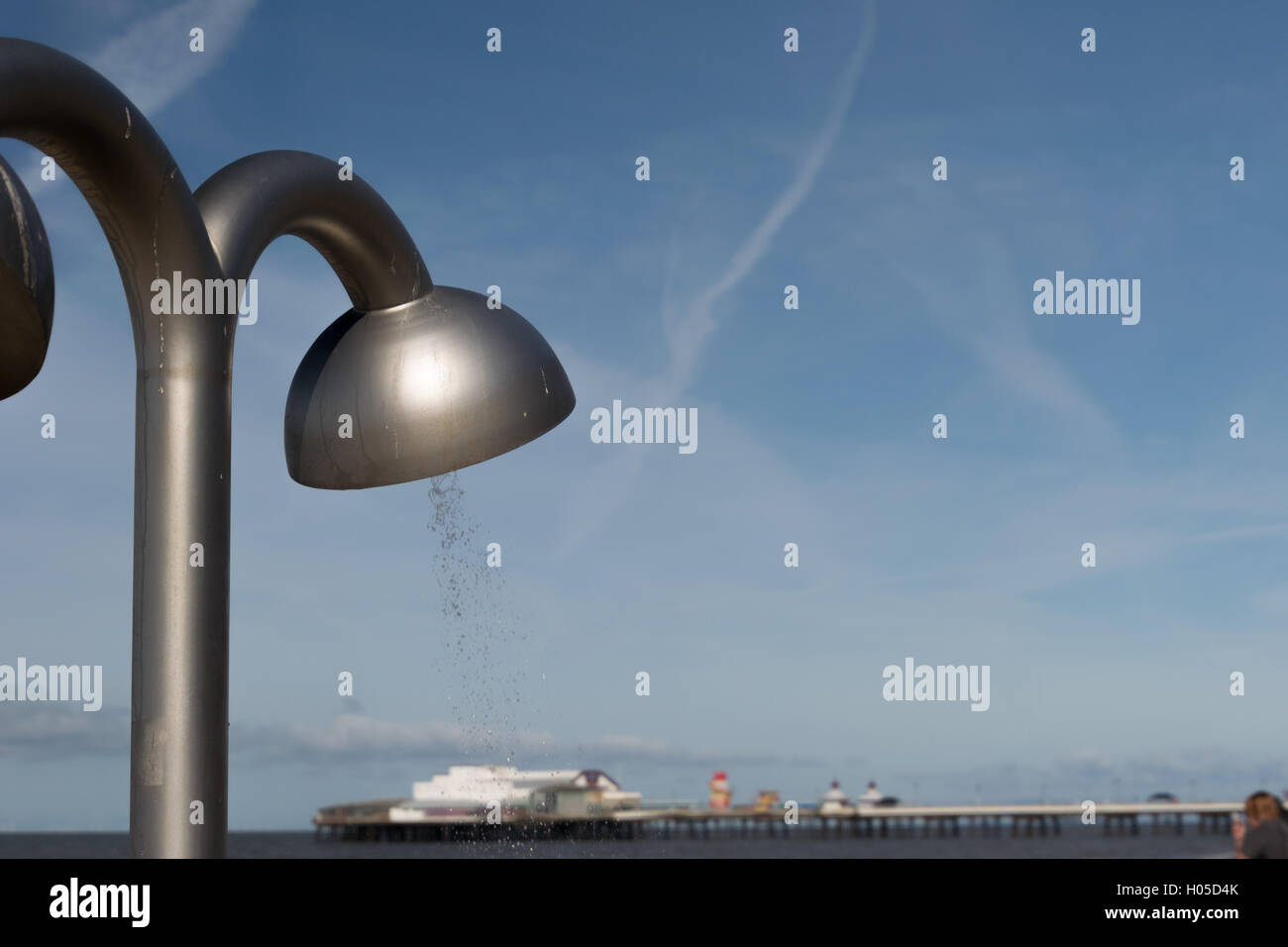 Shower head on the promenade at Blackpool and pier Stock Photo Alamy