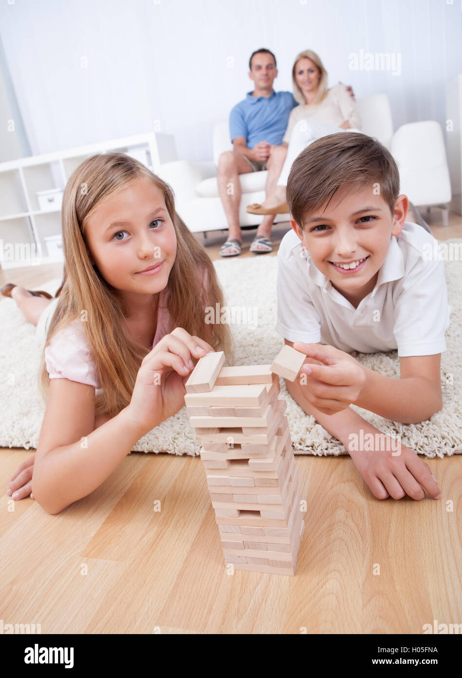 Children Playing With Wooden Blocks Stock Photo - Alamy