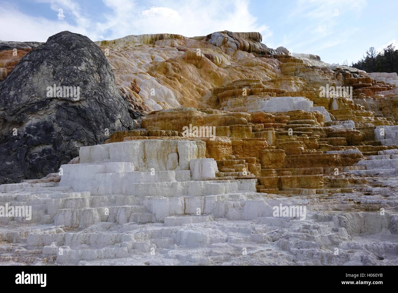 Travertine deposits from hot springs, lower terraces at Mammoth Hot Springs, Yellowstone National Park Stock Photo