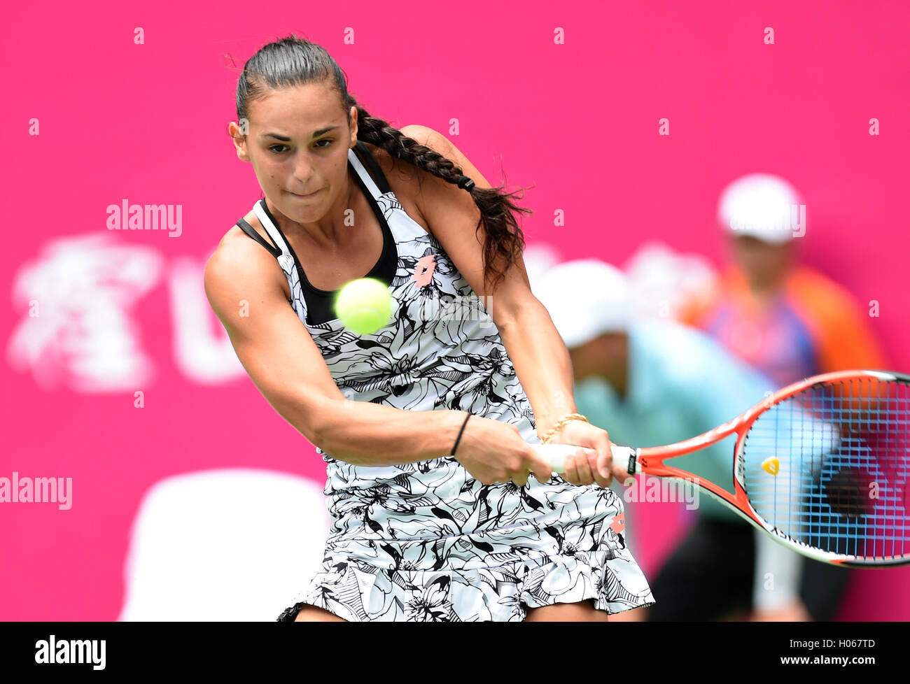 Guangzhou, China's Guangdong Province. 20th Sep, 2016. Italy's Cristiana  Ferrando returns the ball to Nigina Abduraimova of Uzbekistan during their  singles first round match at 2016 WTA Guangzhou International Women's Open  in