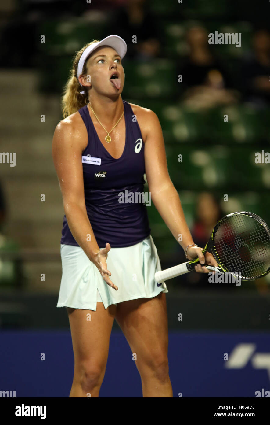 Tokyo, Japan. 20th Sep, 2016. Coco Vandeweshe of the United States sticks  her tongue as she lost a key point against Ukraine's Elina Svitolina duirng  the first round of the Toray Pan