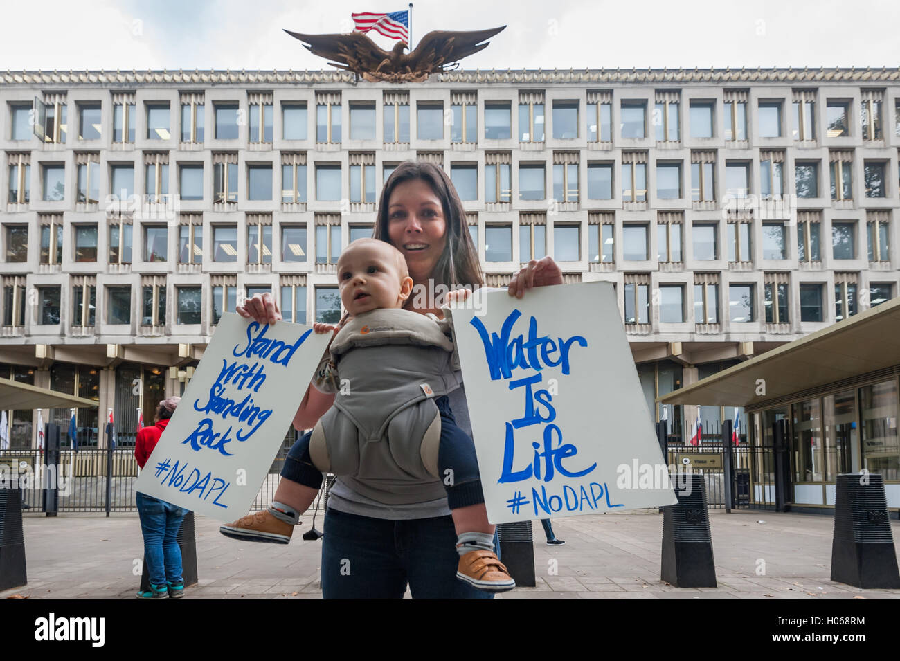 London, UK. 19th September 2016. People stand outside the US Embassy in a non-violent, prayerful act of solidarity with the Standing Rock Sioux Tribe threatened by the construction of a huge oil pipeline close to their reservation in North Dakota and the Missouri River. Credit:  Peter Marshall/Alamy Live News Stock Photo