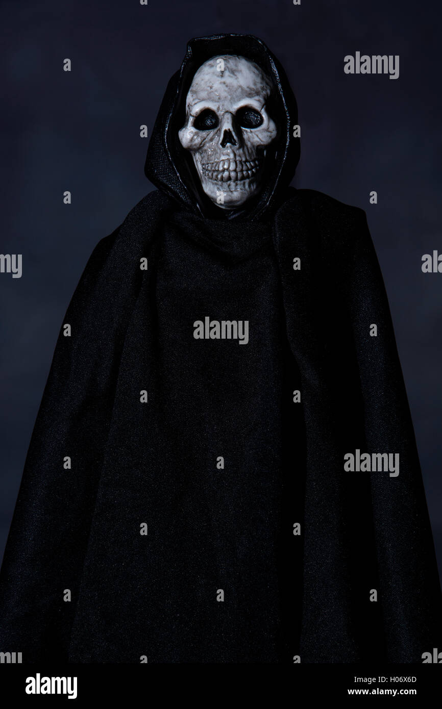Scary Halloween Grim Reaper character Stock Photo