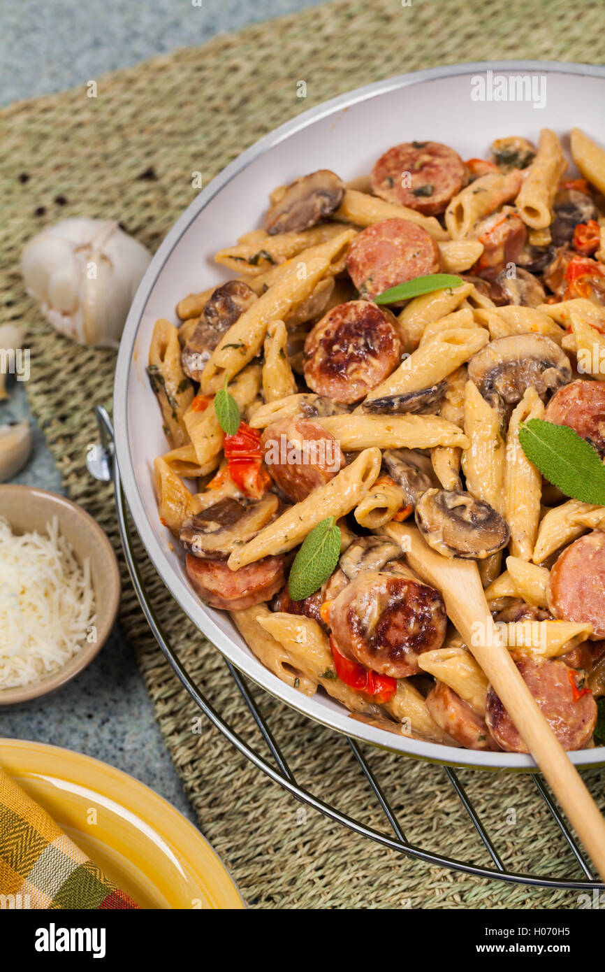 Sausage Pasta Alfredo Dinner Stock Photo - Alamy