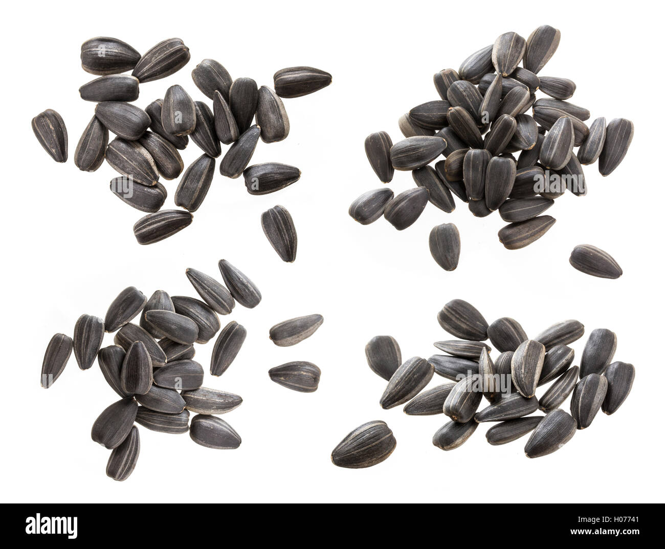 Black sunflower seeds isolated on white background. Pile of sunflower ...