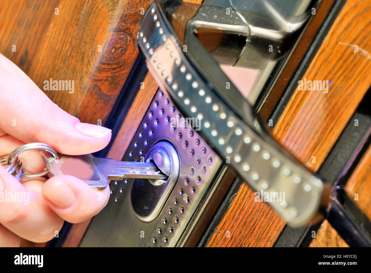 open door with key Stock Photo Alamy