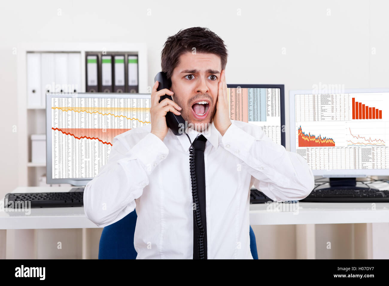 Worried Stock Broker On The Phone Stock Photo Alamy Worried Stock Broker On The Phone Stock Photo Alamy