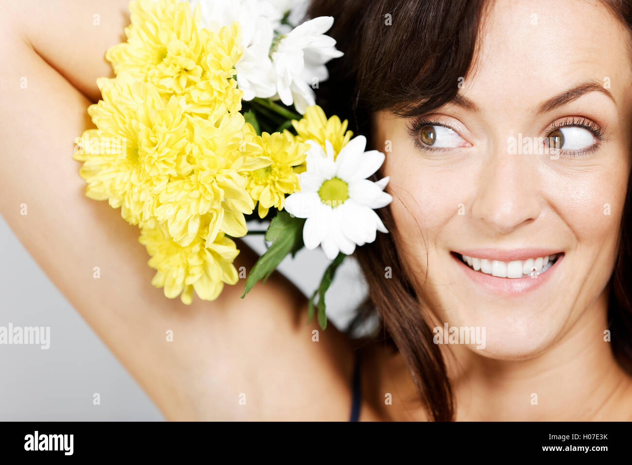 Woman holding flowers Stock Photo Alamy