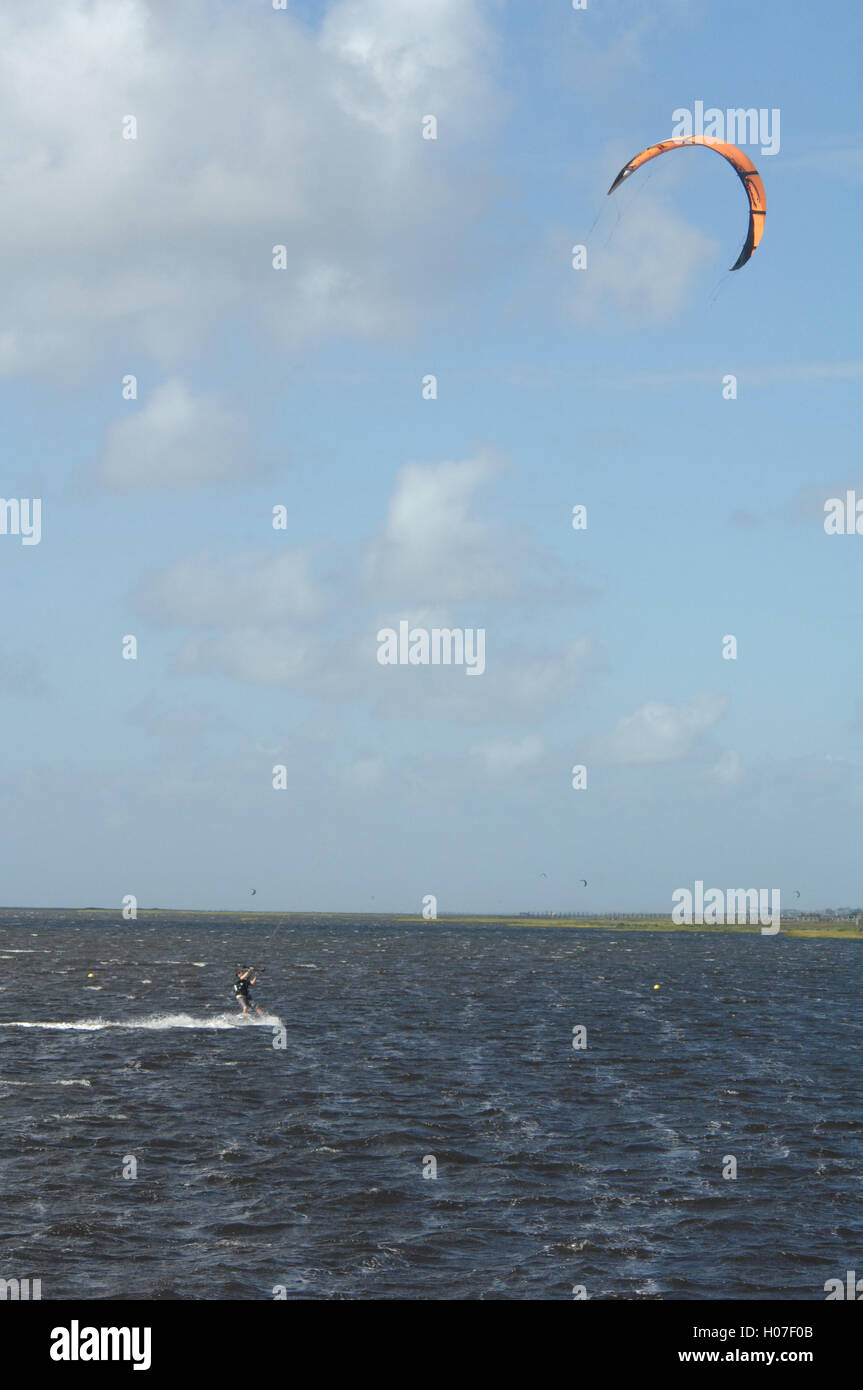 kite surfer surfing beach Outer Banks orange speed chop waves ocean