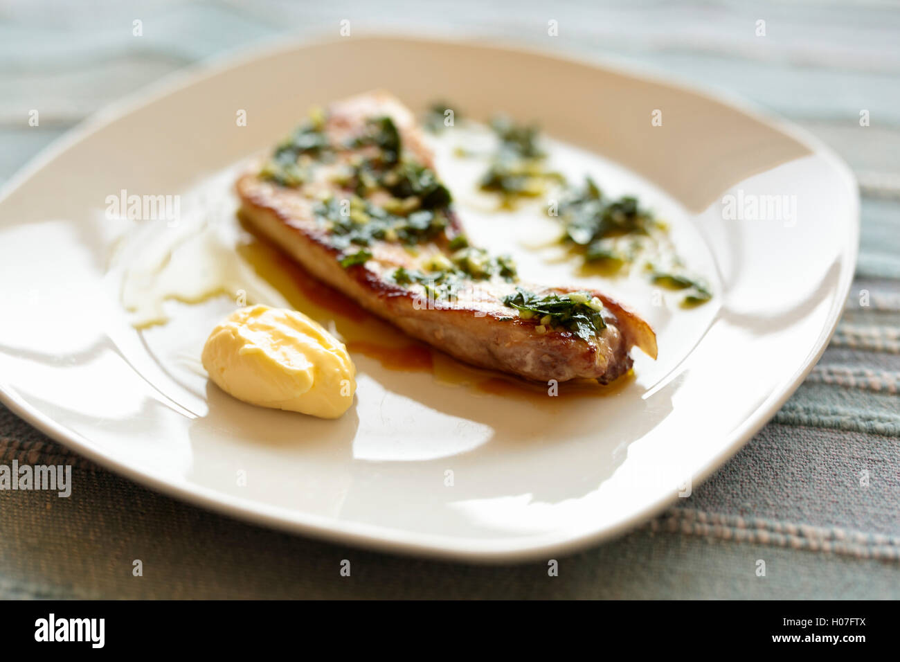 Grilled swordfish with garlic sauce and perjil Stock Photo Alamy