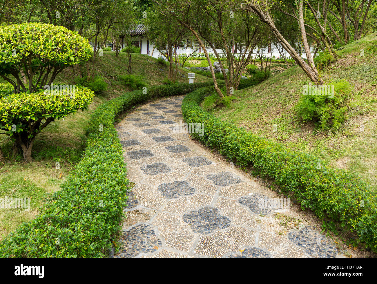 Pebble stone path in chinese garden Stock Photo