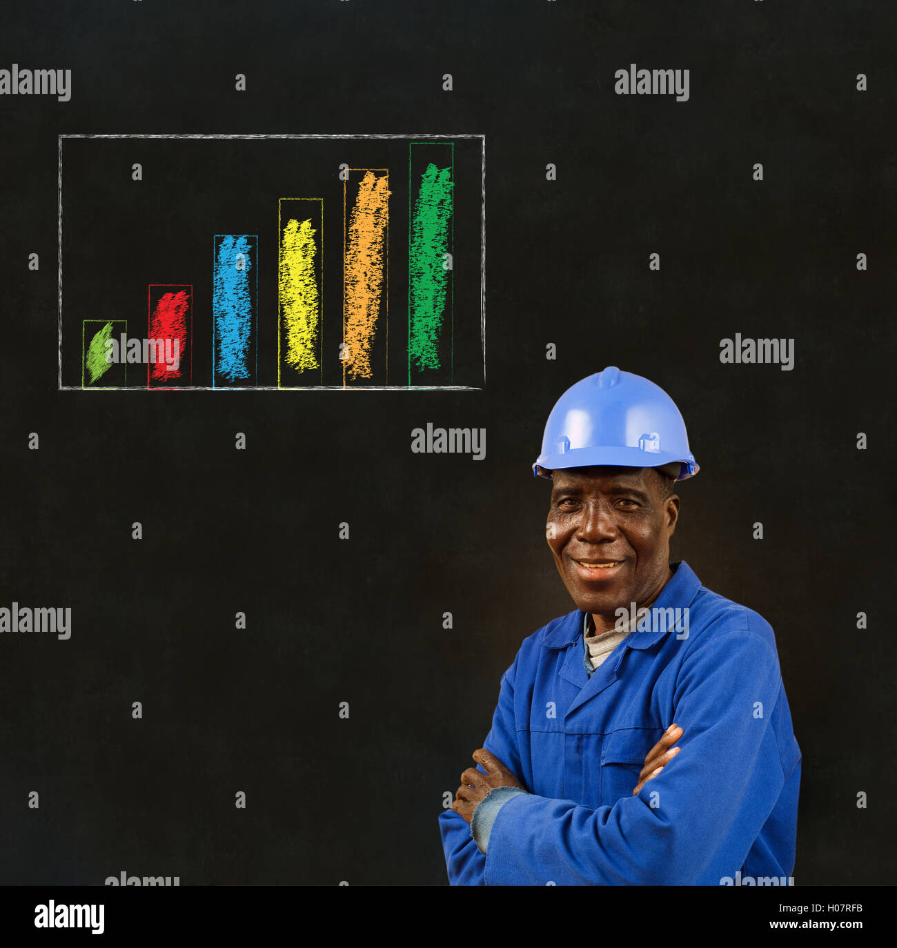 African American black man worker with chalk bar graph on a blackboard background Stock Photo