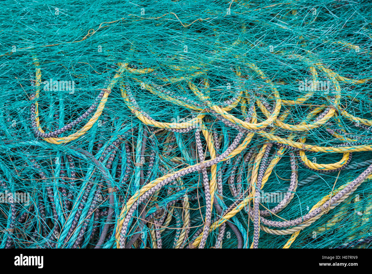 Piles of colorful fishing rope and net at Trout River, Newfoundland and Labrador, Canada. Stock Photo