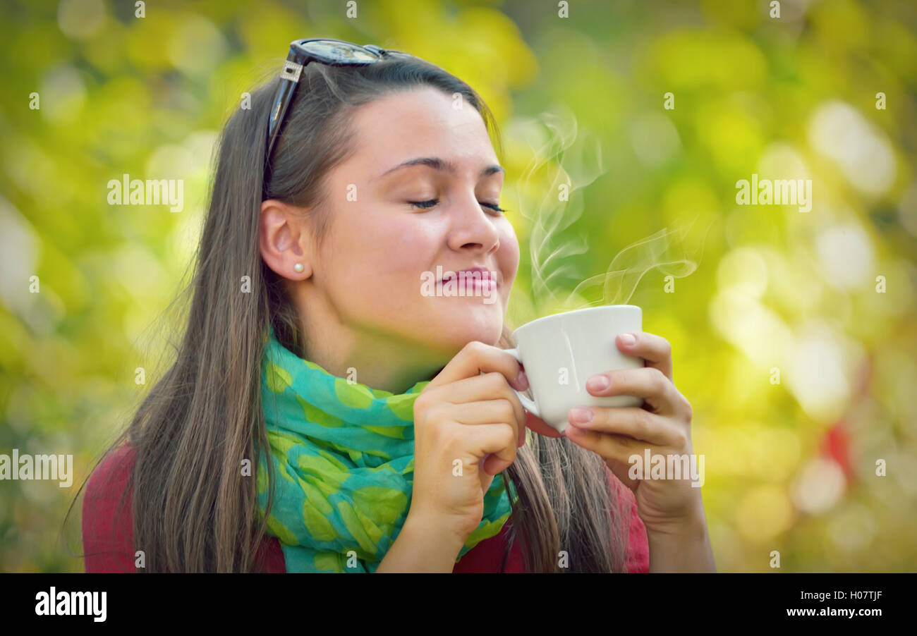 Beautiful Girl enjoy a coffee in Nature Stock Photo Alamy