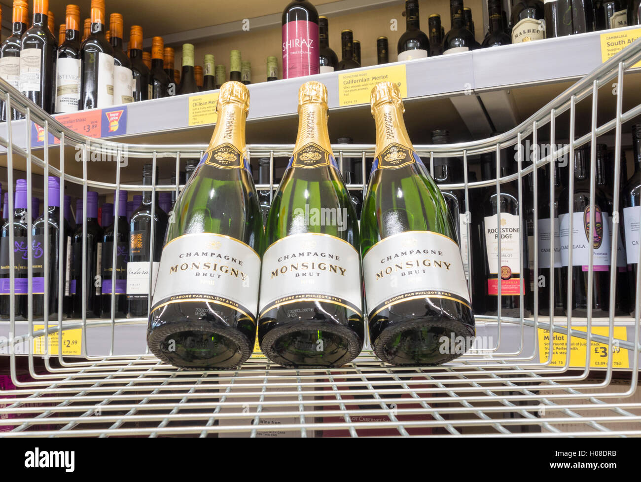 Bottles of Monsigny brut champagne in shopping trolley in Aldi