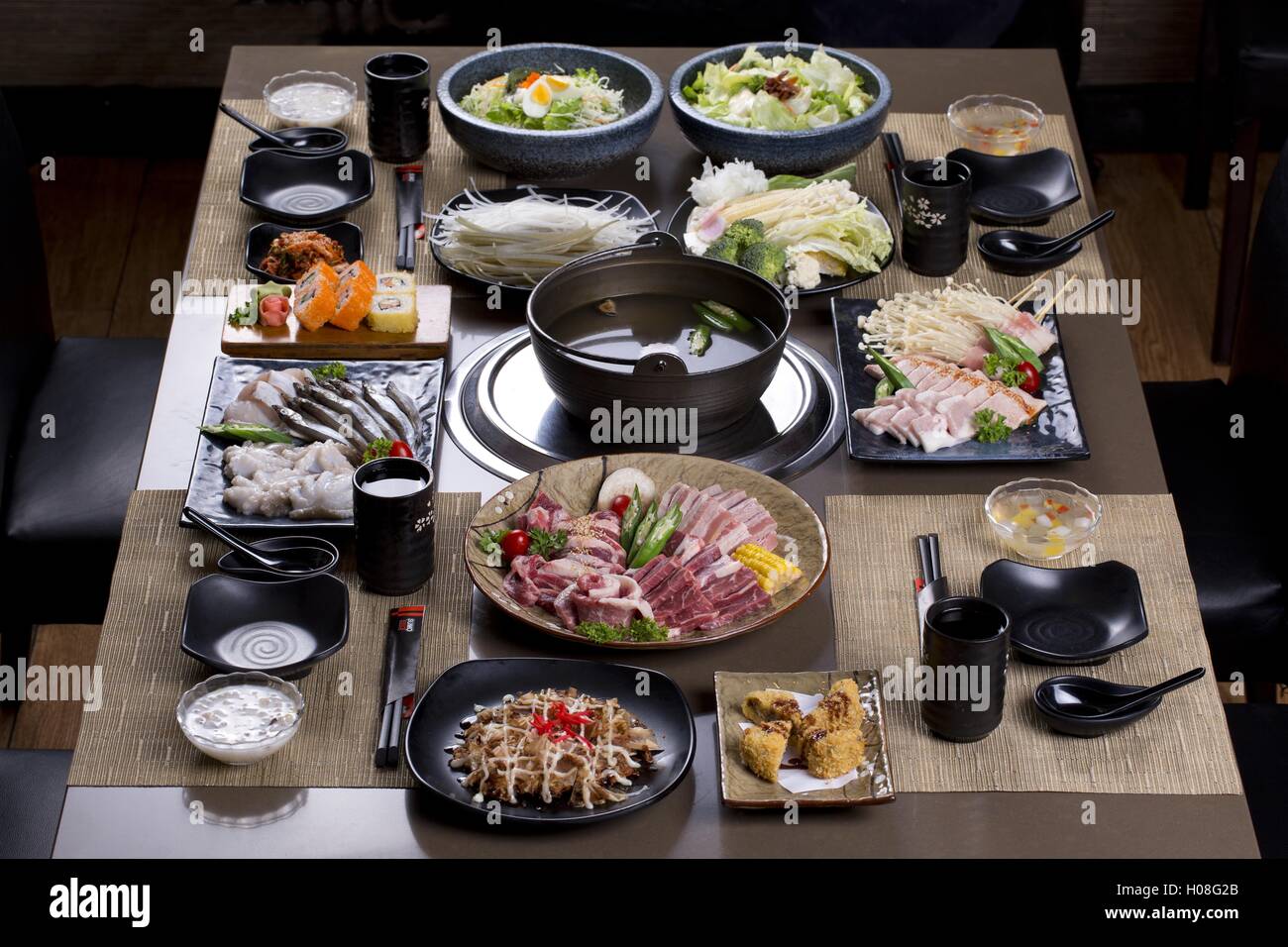 A traditional Japanese style of hot pot are being served on the table in a  Vietnamese restaurant Stock Photo - Alamy