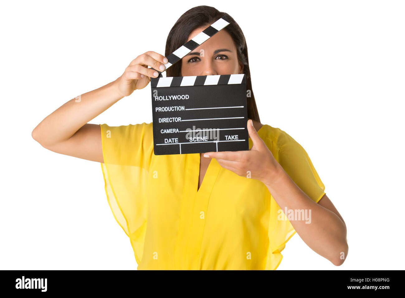 Woman holding a clapperboard, isolated in white Stock Photo