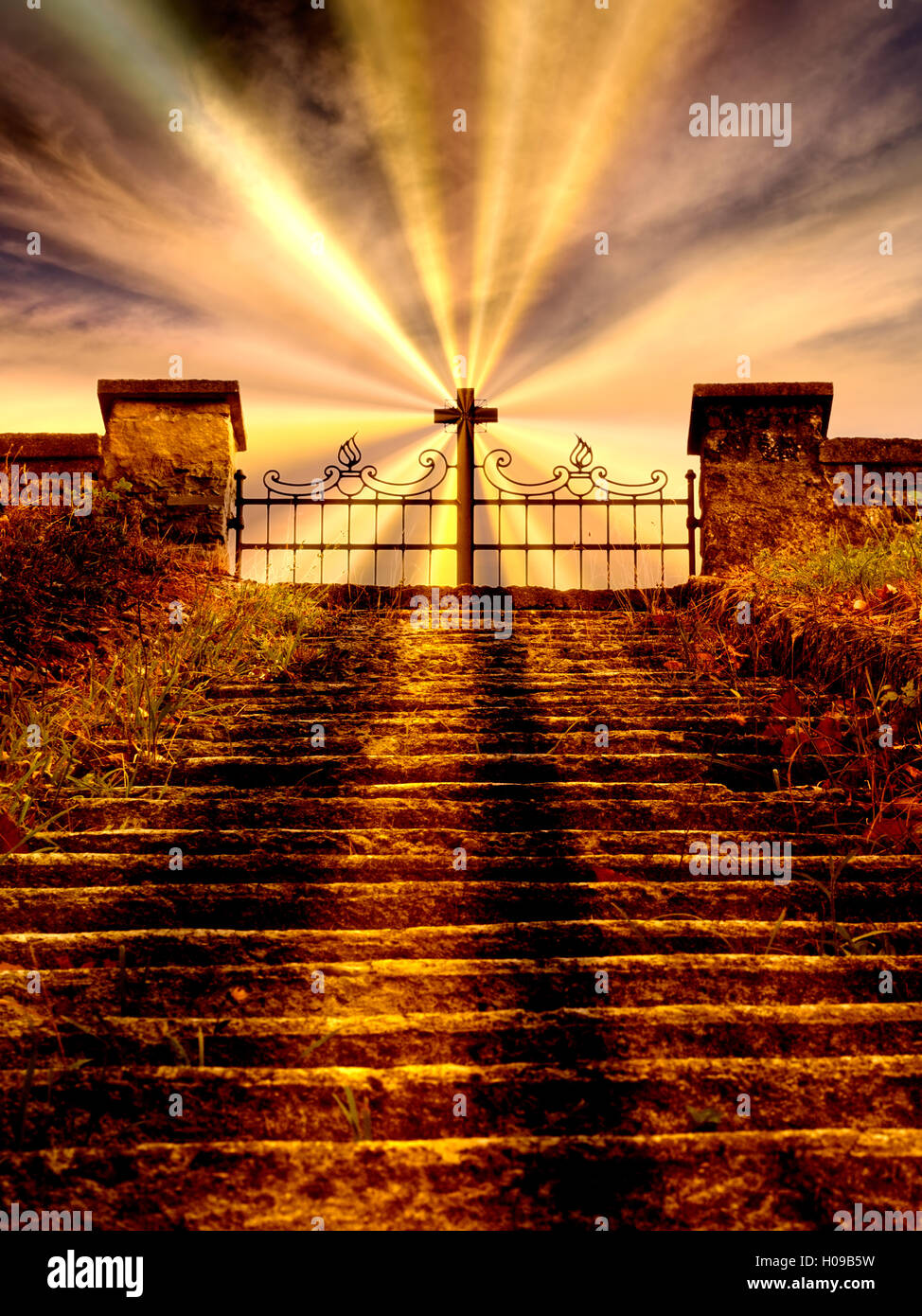Stairway to heaven, afterlife. Cross on gate. With rays. Stock Photo