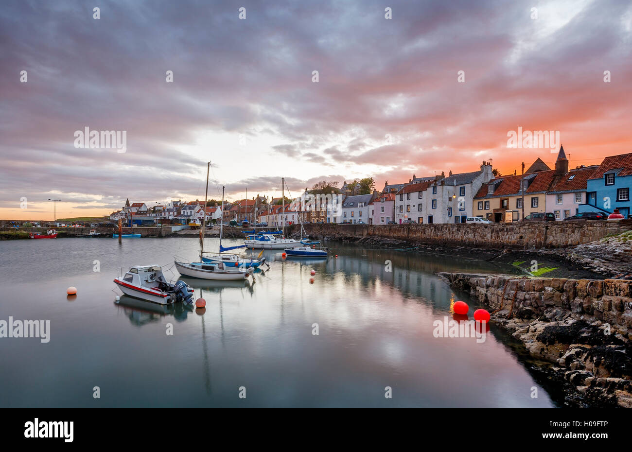 Sailing boats at sunset in the harbour at St. Monans, Fife, East Neuk, Scotland, United Kingdom, Europe Stock Photo