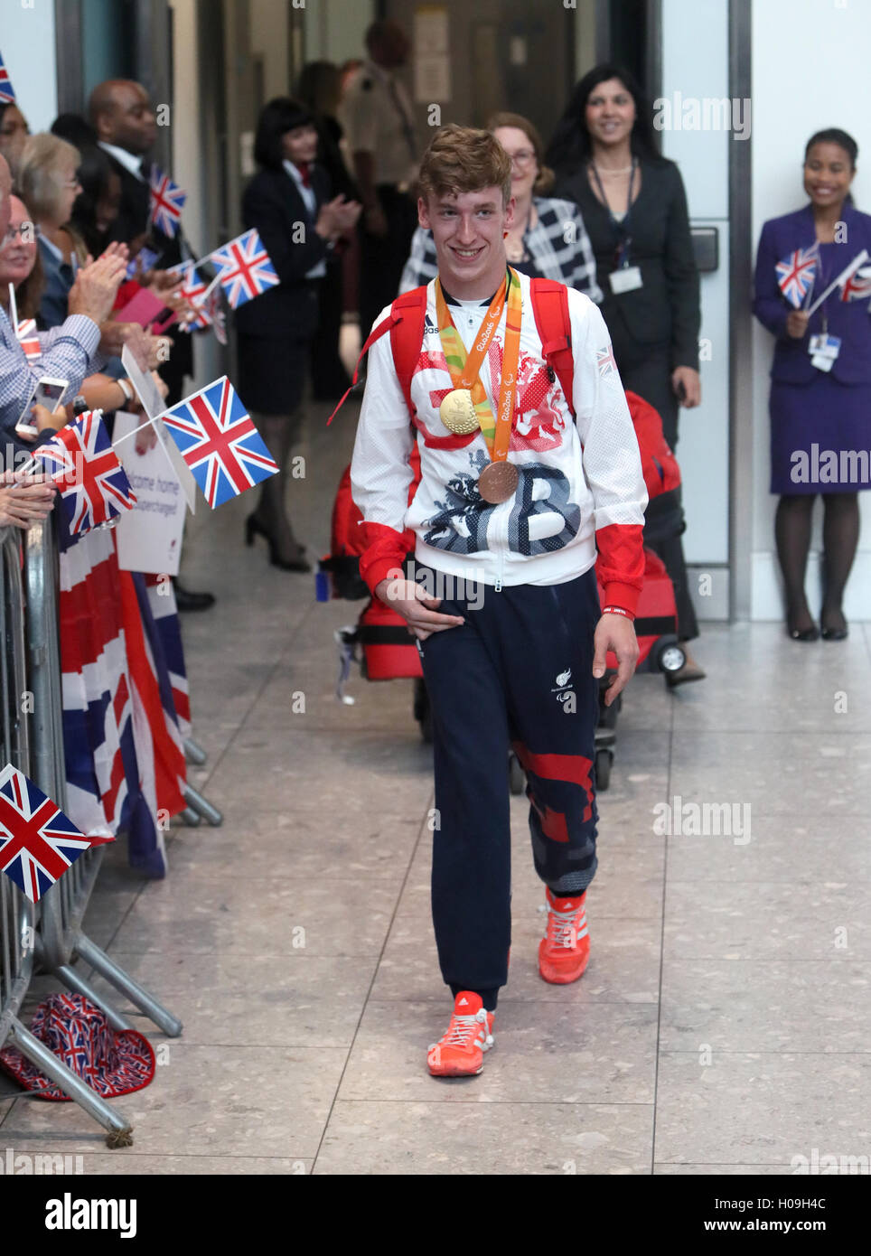 Great Britain's Louis Rolfe arrives back at Heathrow Airport, London ...