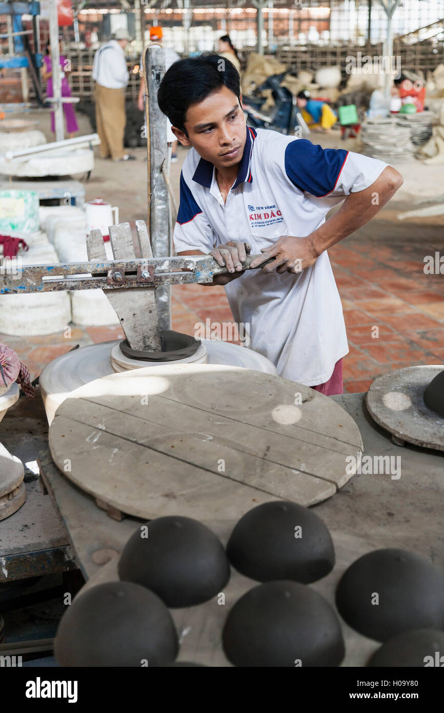 Worker in pottery factory, Vietnam Stock Photo Alamy