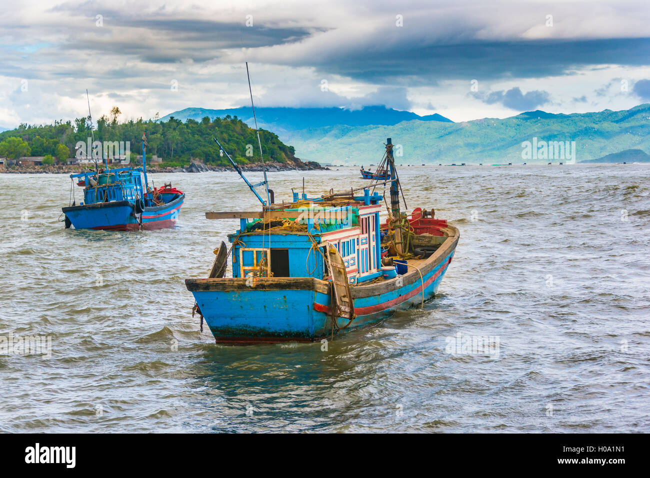 Blue fishing boats, fishing boats on the water, Nha Trang, Khánh Hòa Province, Vietnam Stock Photo